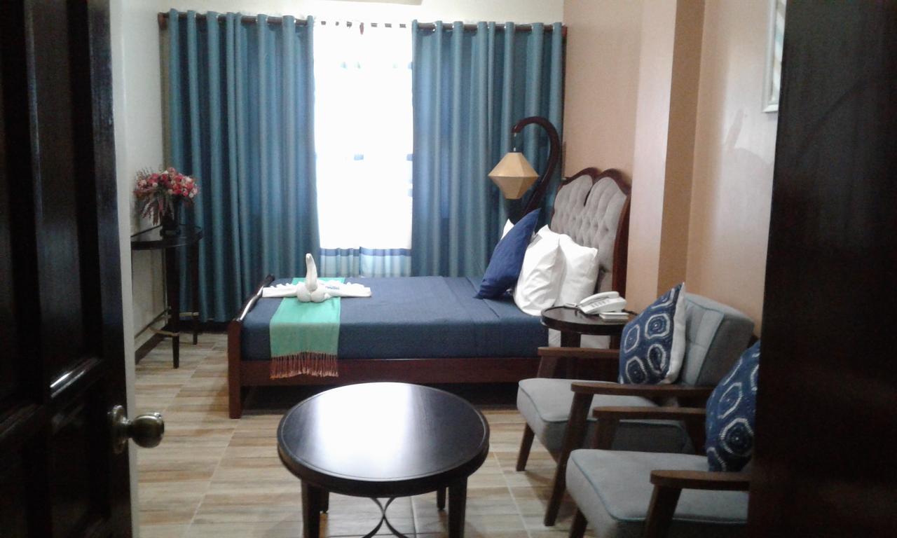 Hotel Charos Dormitel à Dumaguete City Extérieur photo