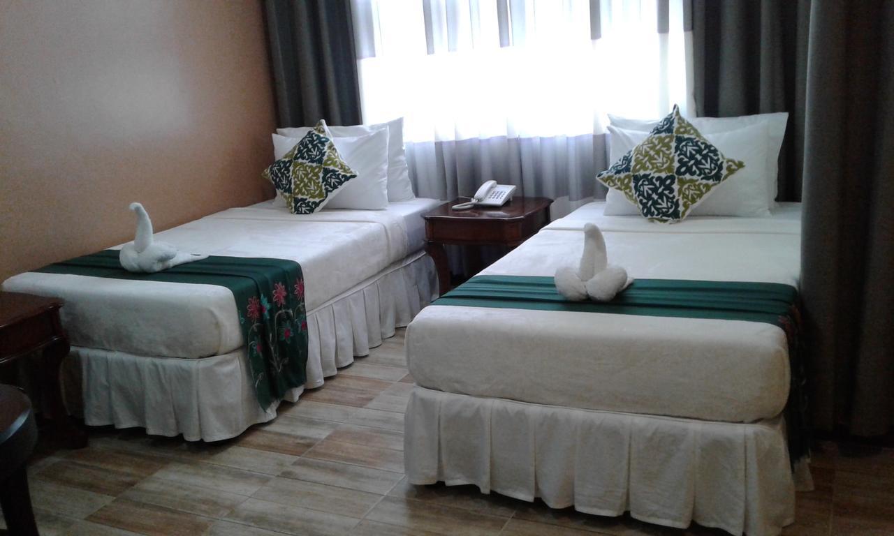 Hotel Charos Dormitel à Dumaguete City Extérieur photo