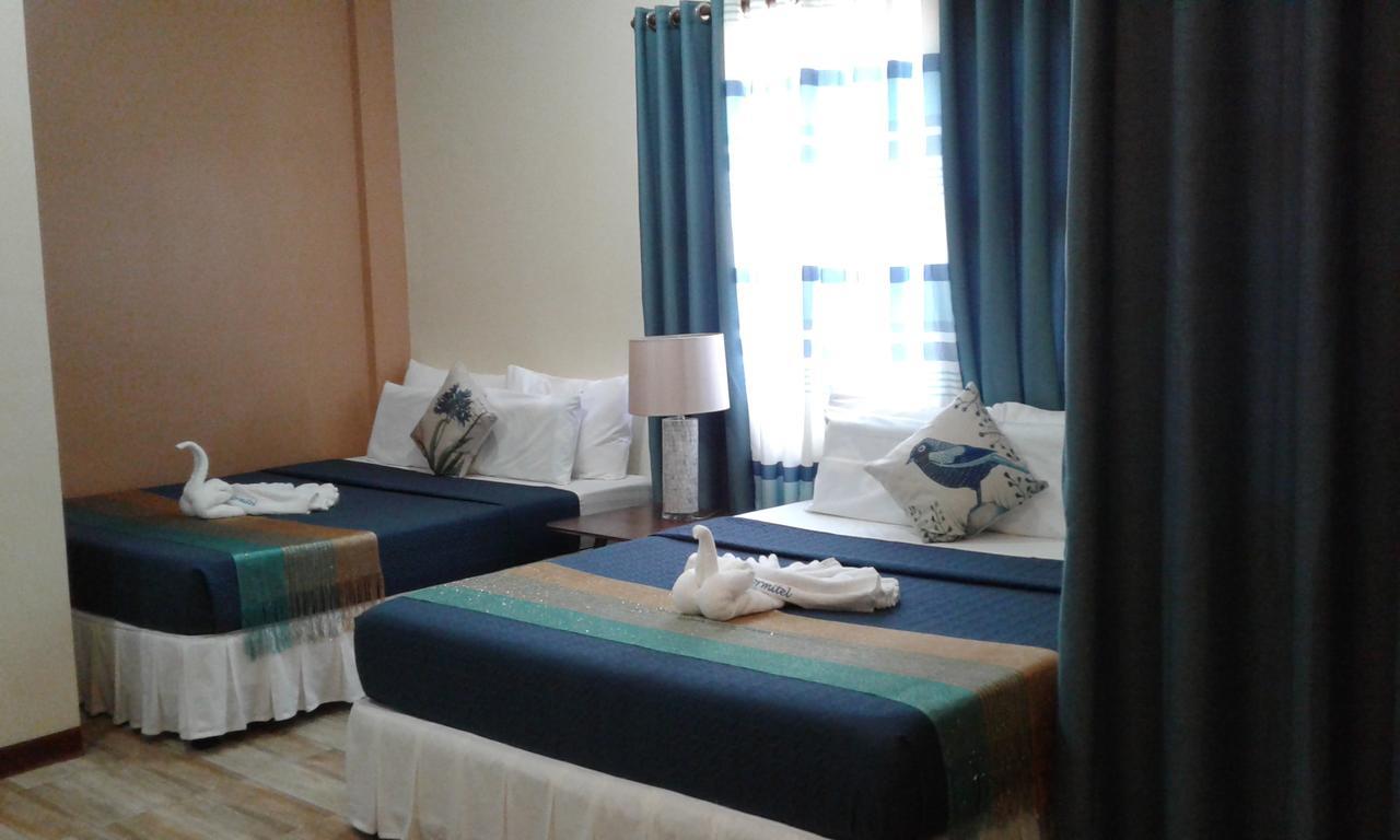Hotel Charos Dormitel à Dumaguete City Extérieur photo