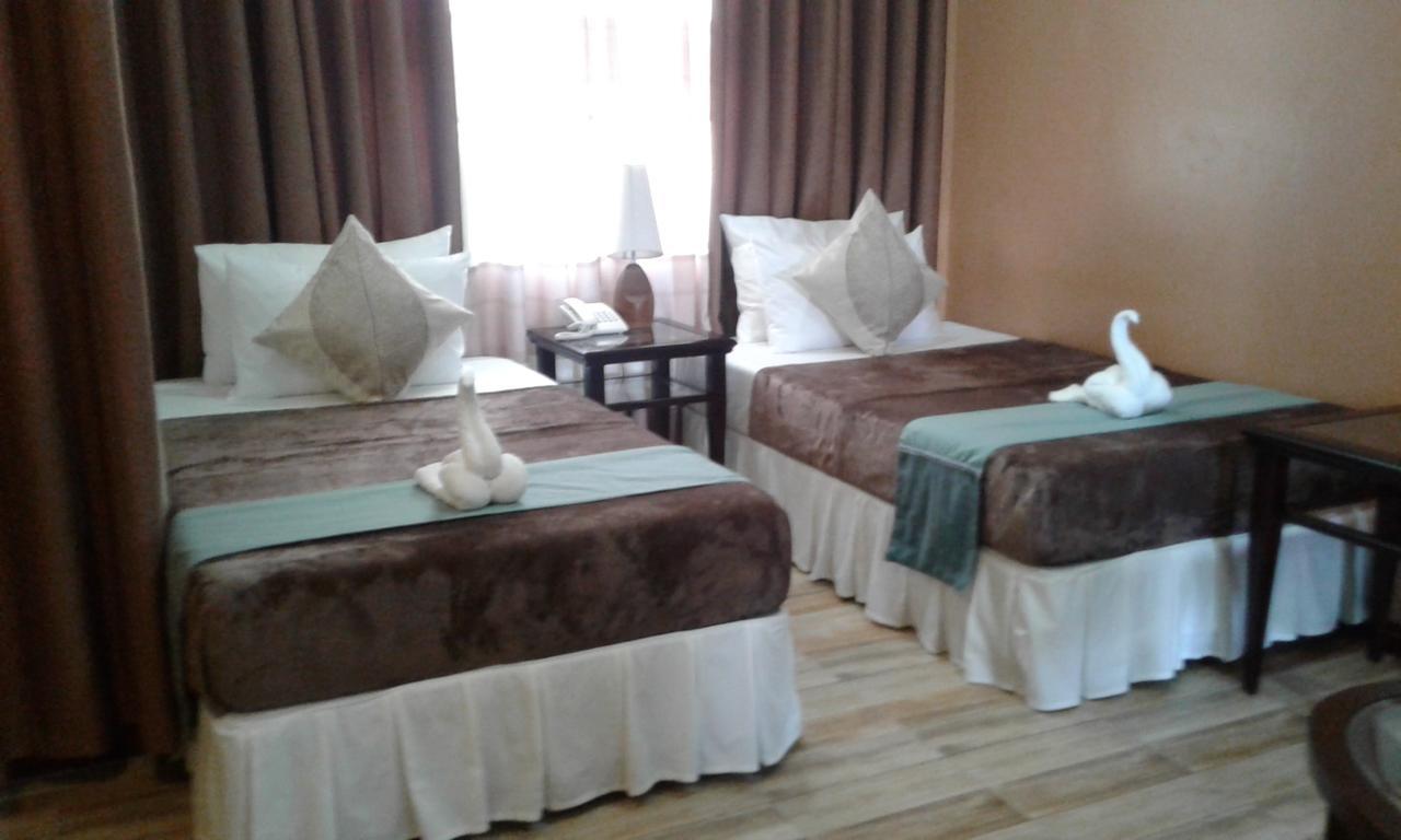 Hotel Charos Dormitel à Dumaguete City Extérieur photo