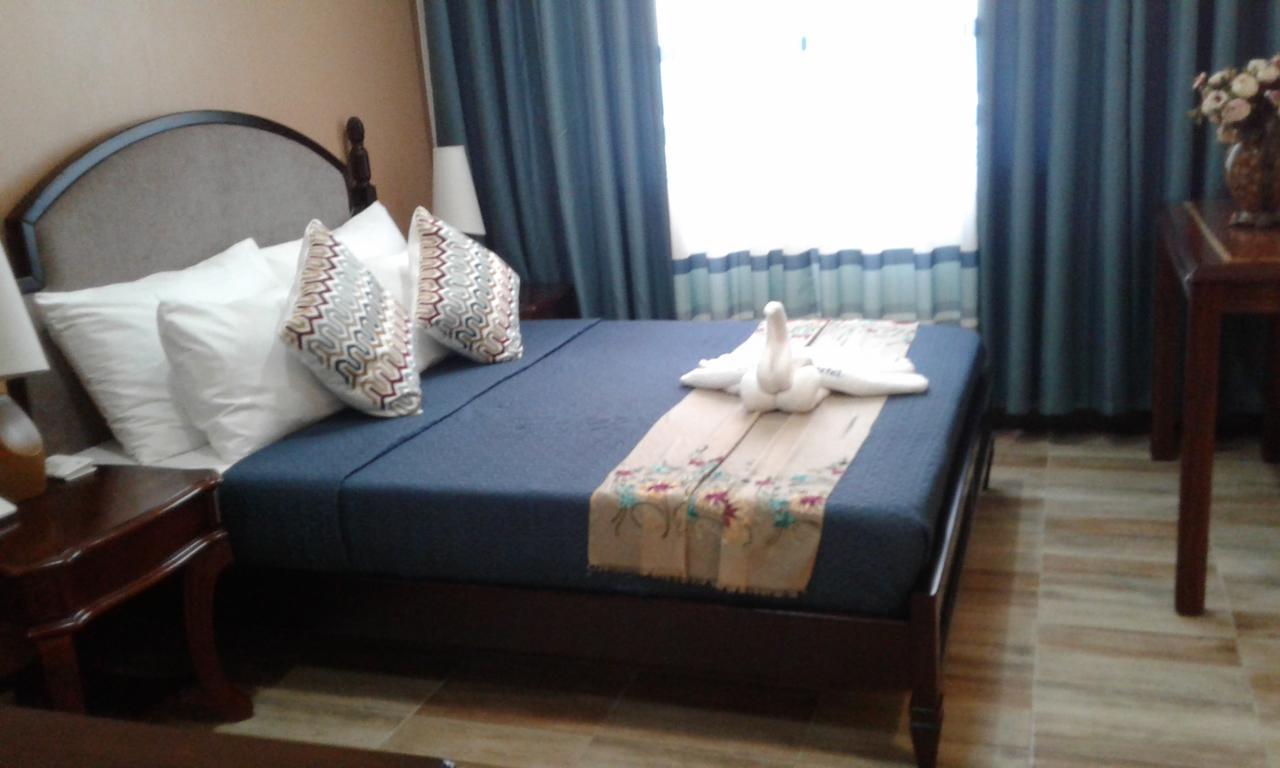 Hotel Charos Dormitel à Dumaguete City Extérieur photo