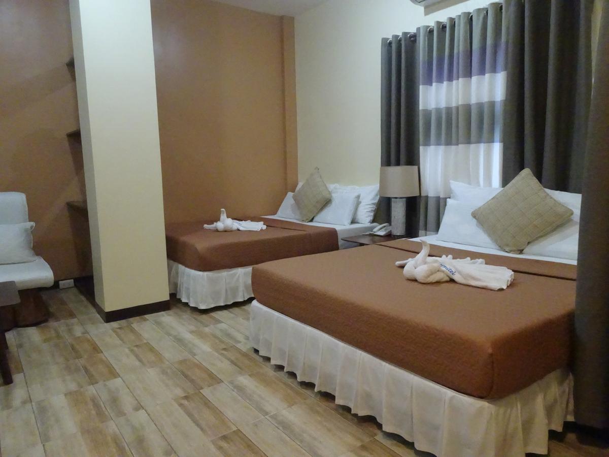 Hotel Charos Dormitel à Dumaguete City Extérieur photo