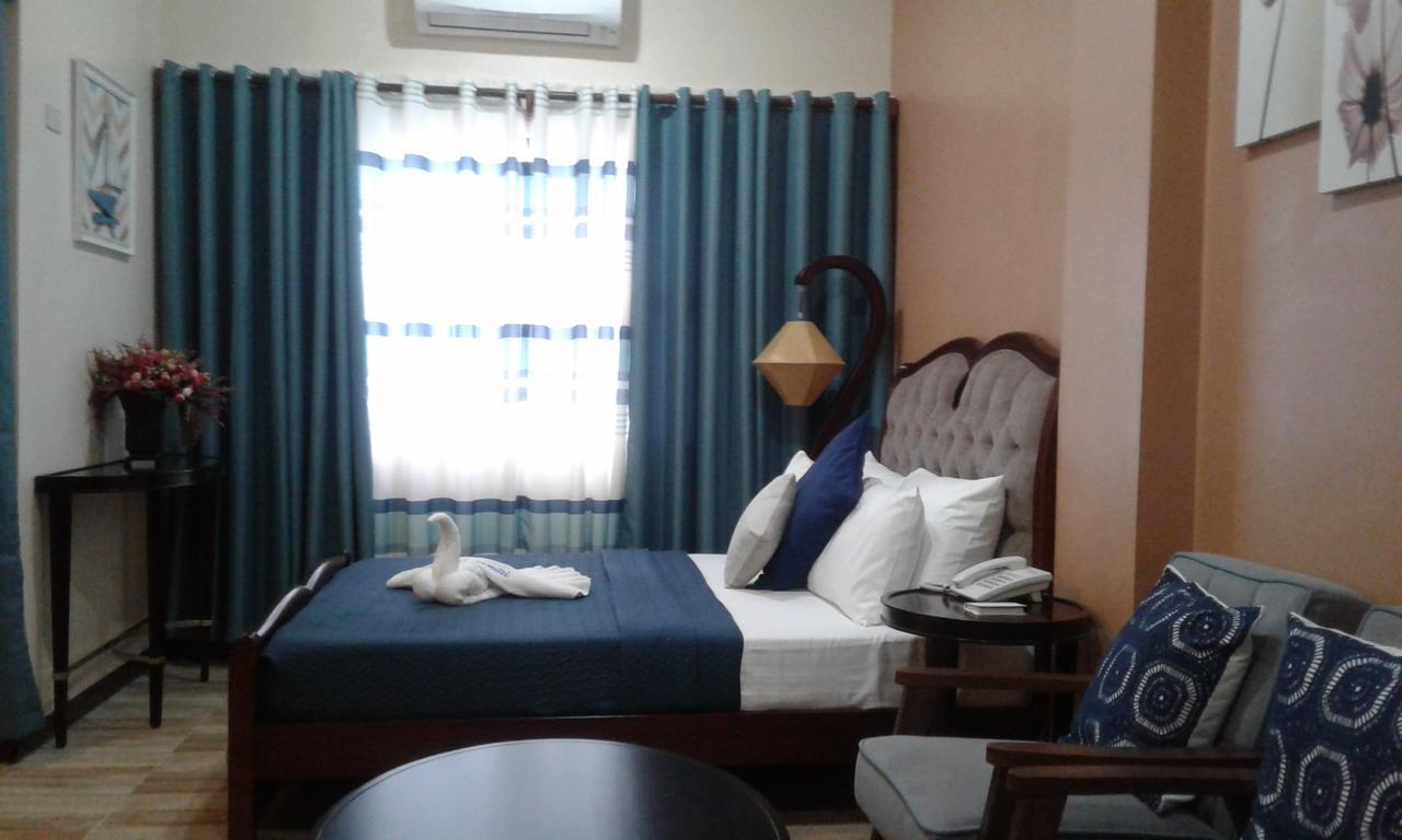 Hotel Charos Dormitel à Dumaguete City Extérieur photo